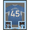 Framed Autographed/Signed Mario Balotelli 35x39 Manchester City Blue Soccer Futbol Jersey Beckett BAS COA