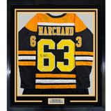 Framed Autographed/Signed Brad Marchand 35x39 Boston Black Hockey Jersey JSA COA