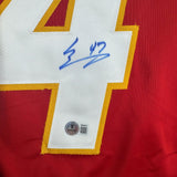 Framed Autographed/Signed Connor Zary 35x39 Calgary Red Hockey Jersey Beckett BAS COA