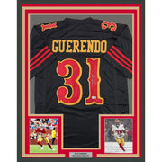Framed Autographed/Signed Isaac Guerendo 35x39 San Francisco Black Rivalries Collection Football Jersey Beckett BAS COA