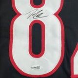 Framed Autographed/Signed Jesperi Kotkaniemi 35x39 Carolina Black Hockey Jersey Beckett BAS COA