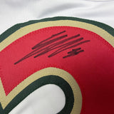 Framed Autographed/Signed Jesper Wallstedt 35x39 Minnesota White 25th Anniversary Hockey Jersey Beckett BAS COA