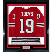 Framed Autographed/Signed Jonathan Toews 35x39 Chicago Red Hockey Jersey Beckett BAS COA